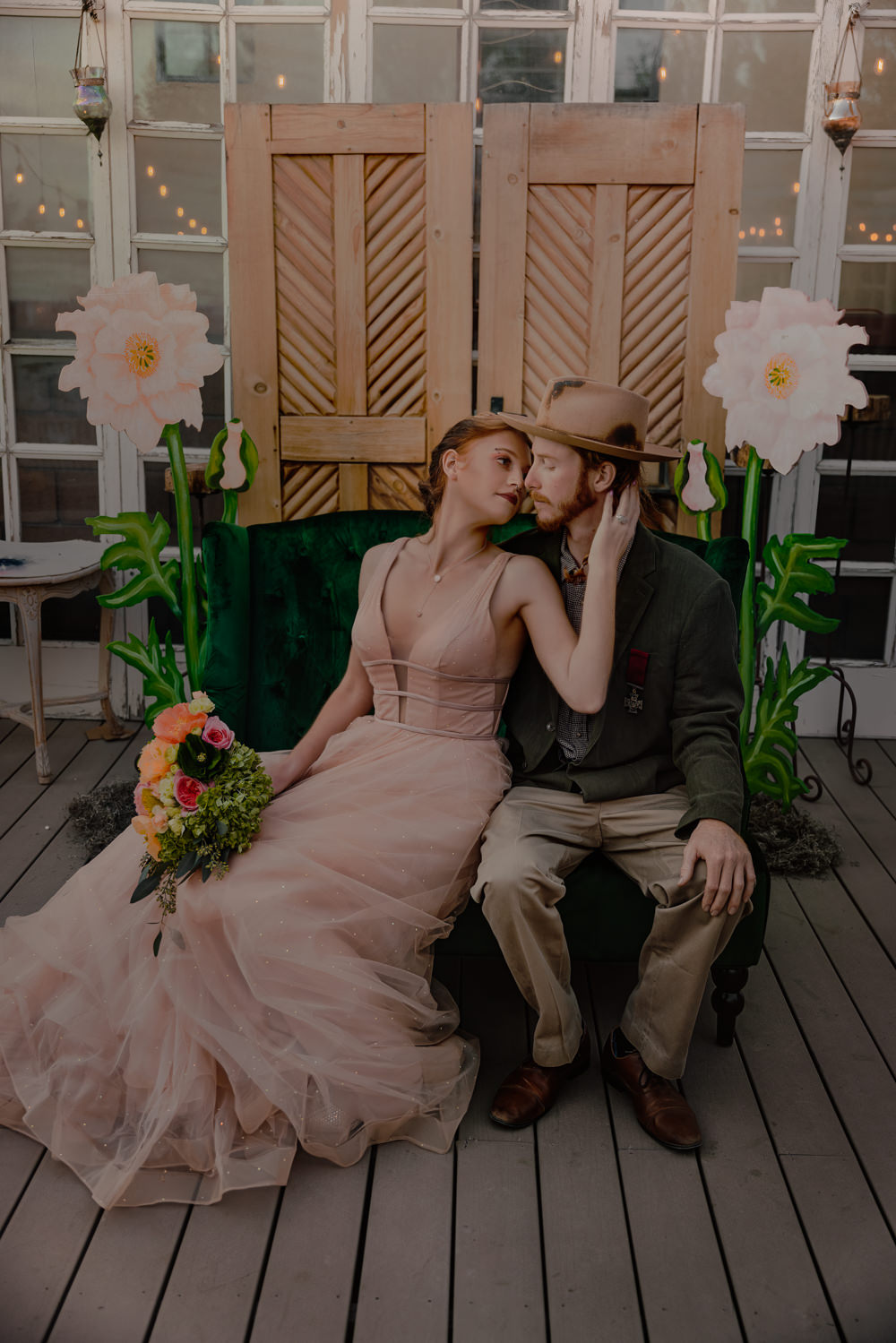 Door Backdrop Large Paper Flowers Festoon Lights Ceremony Aisle Wizard Oz Emerald City Wedding Claire Gutierrez Photography
