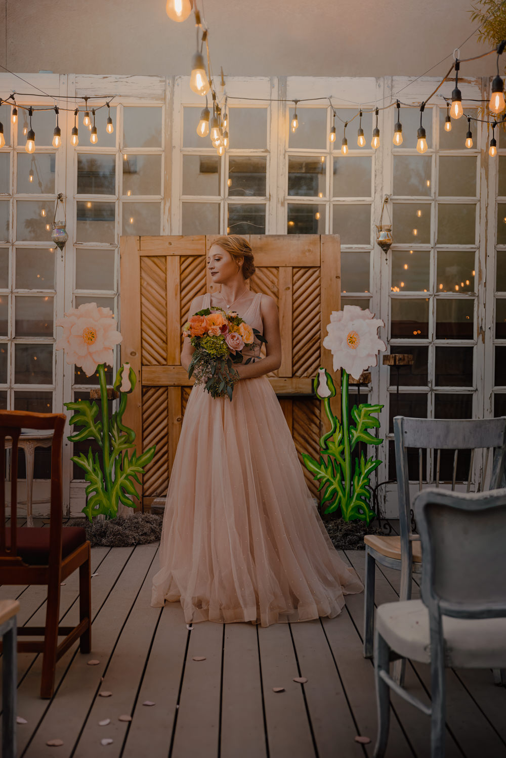 Door Backdrop Large Paper Flowers Festoon Lights Ceremony Aisle Wizard Oz Emerald City Wedding Claire Gutierrez Photography