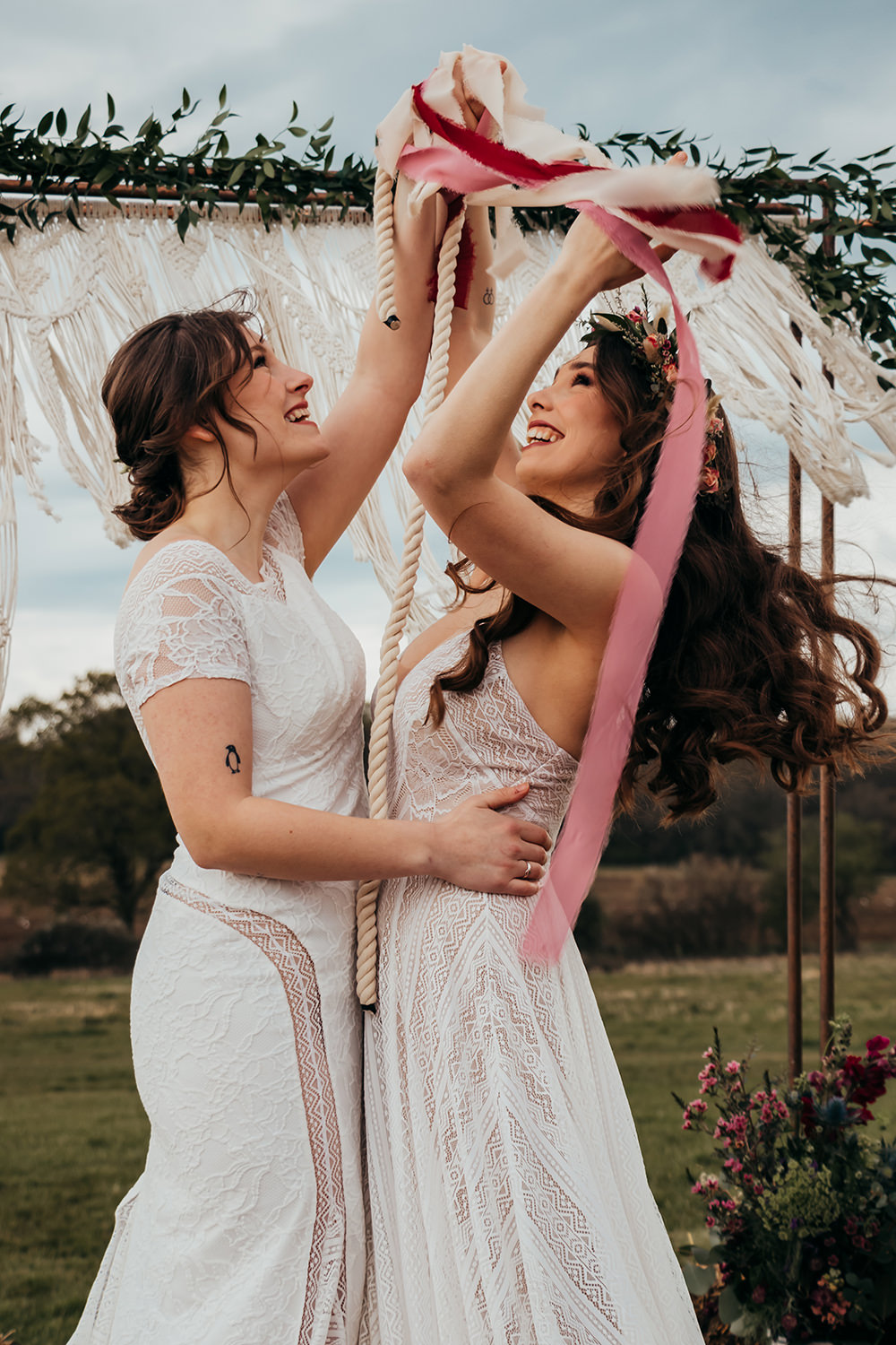 Handfasting Ceremony Macrame Backdrop Aircraft Hangar Wedding Sherri OMalley Photography