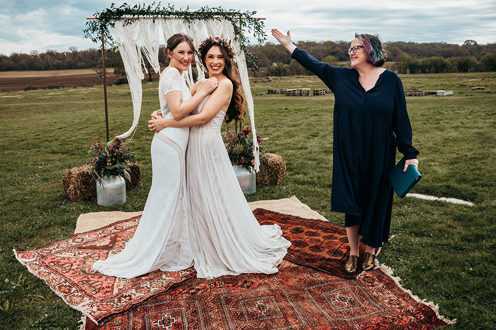 Macrame Backdrop Ceremony Rugs Aircraft Hangar Wedding Sherri OMalley Photography