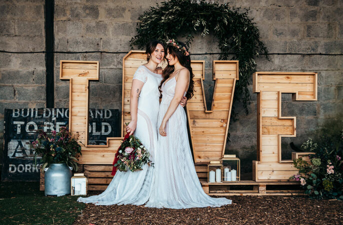 Wooden LOVE Letter Lights Aircraft Hangar Wedding Sherri OMalley Photography