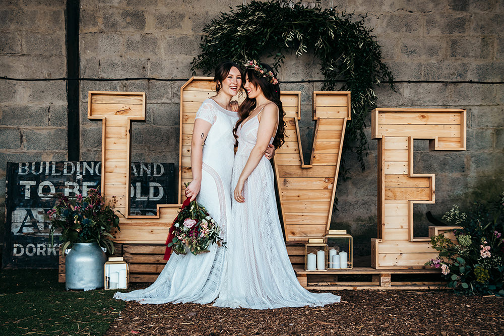 Wooden LOVE Letter Lights Aircraft Hangar Wedding Sherri OMalley Photography