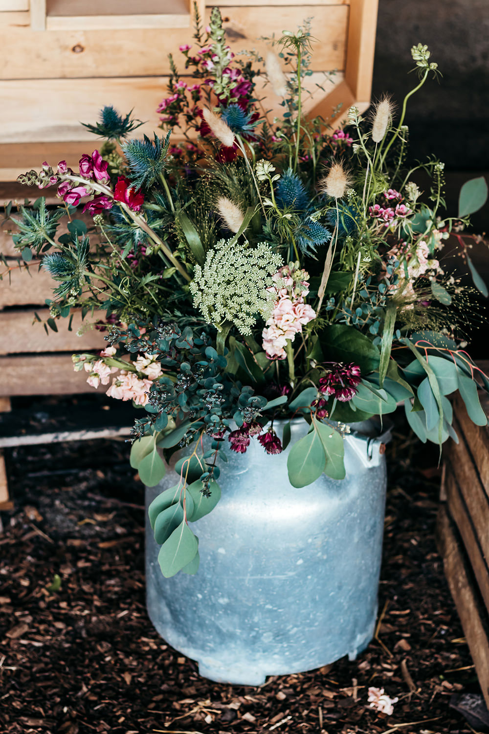 Milk Churn Flowers Aircraft Hangar Wedding Sherri OMalley Photography