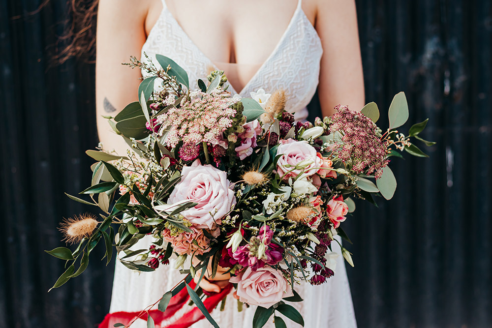 Bouquet Flowers Bride Bridal Cream Pink Aircraft Hangar Wedding Sherri OMalley Photography