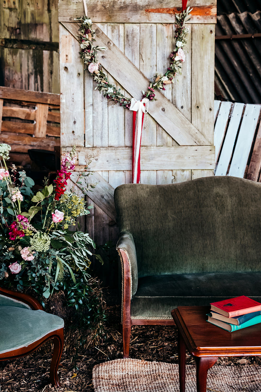 Seating Area Sofa Flowers Aircraft Hangar Wedding Sherri OMalley Photography