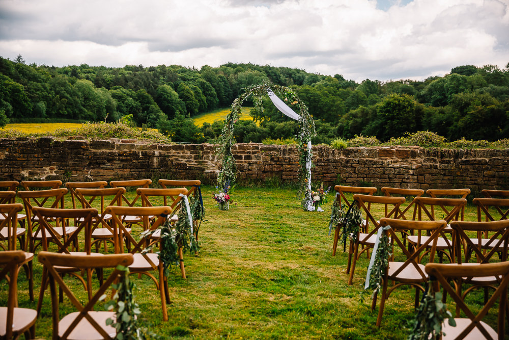 Chair Aisle Flowers Greenery Arch Beauvale Priory Wedding Lisa Marie Halliday
