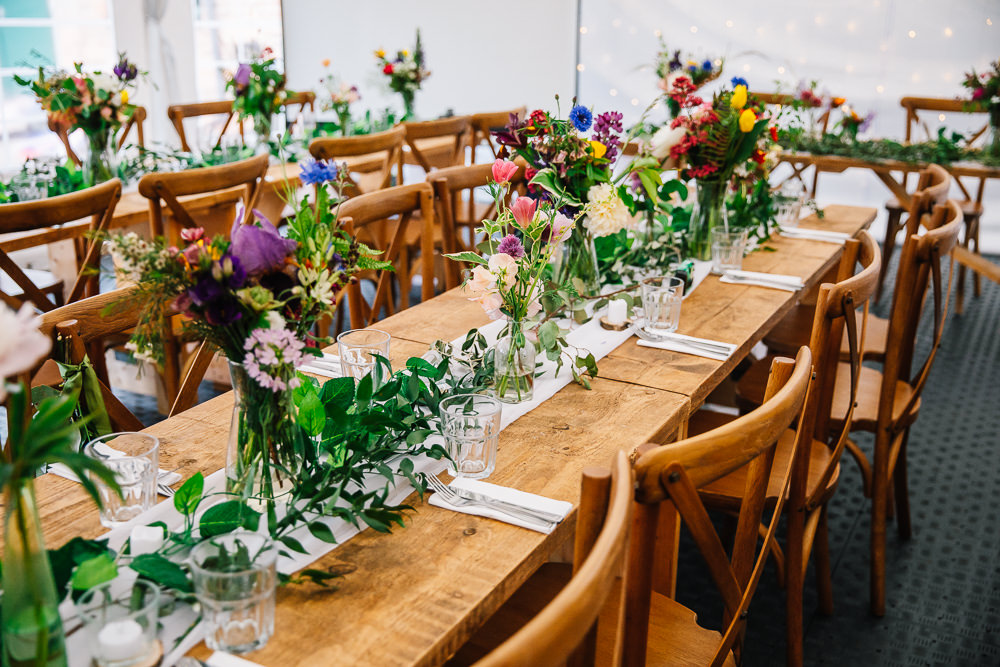 Long Wooden Tables Colourful Flowers Greenery Decor Centrepiece Beauvale Priory Wedding Lisa Marie Halliday