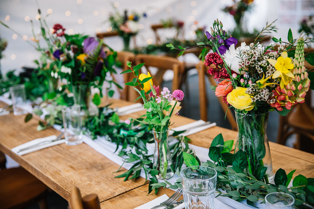 Long Wooden Tables Colourful Flowers Greenery Decor Centrepiece Beauvale Priory Wedding Lisa Marie Halliday