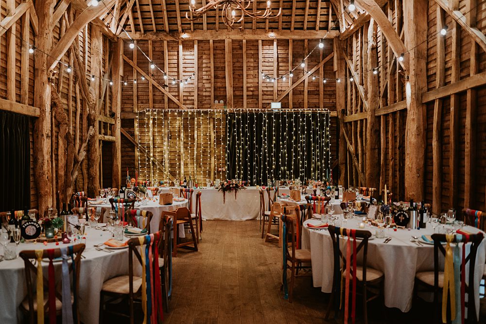 Barn Festoon Lights Rainbow Ribbons Chairs Decor Farmhouse Redcoats Wedding Bubear Photography