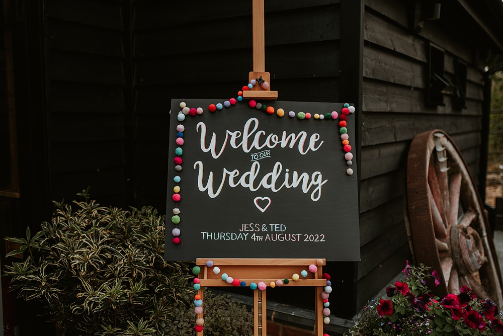 Chalkboard Welcome Sign Pom Pom Farmhouse Redcoats Wedding Bubear Photography