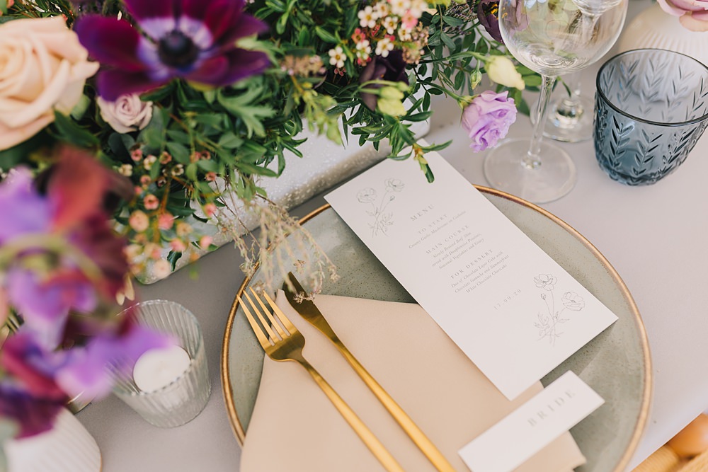 Table Decor Pink Purple Flowers Grey Cloth Gold Cutlery Place Setting Lakeside Wild Berry Farm Wedding Love and Life Studio