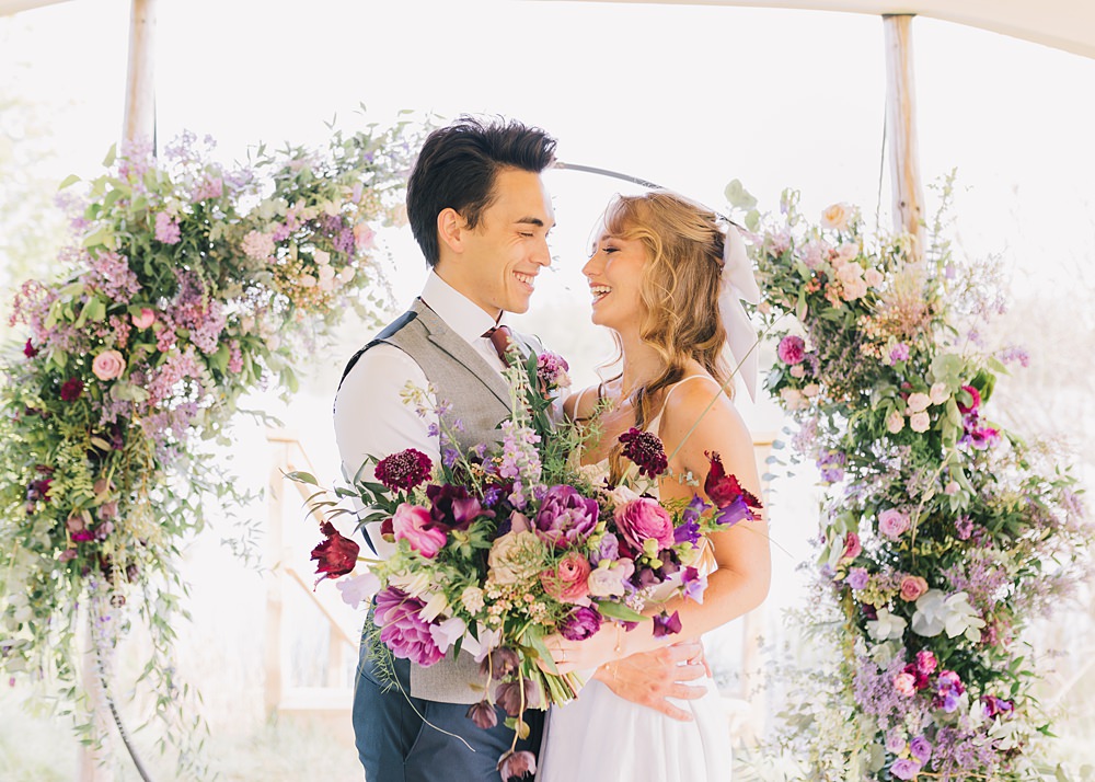 Lakeside Wild Berry Farm Wedding Love and Life Studio Moon Gate Flower Hoop Backdrop Purple Pink Flowers