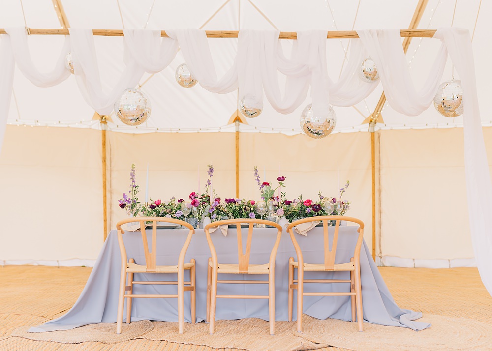 Table Decor Pink Purple Flowers Grey Cloth Gold Cutlery Disco Balls Drapes Lakeside Wild Berry Farm Wedding Love and Life Studio