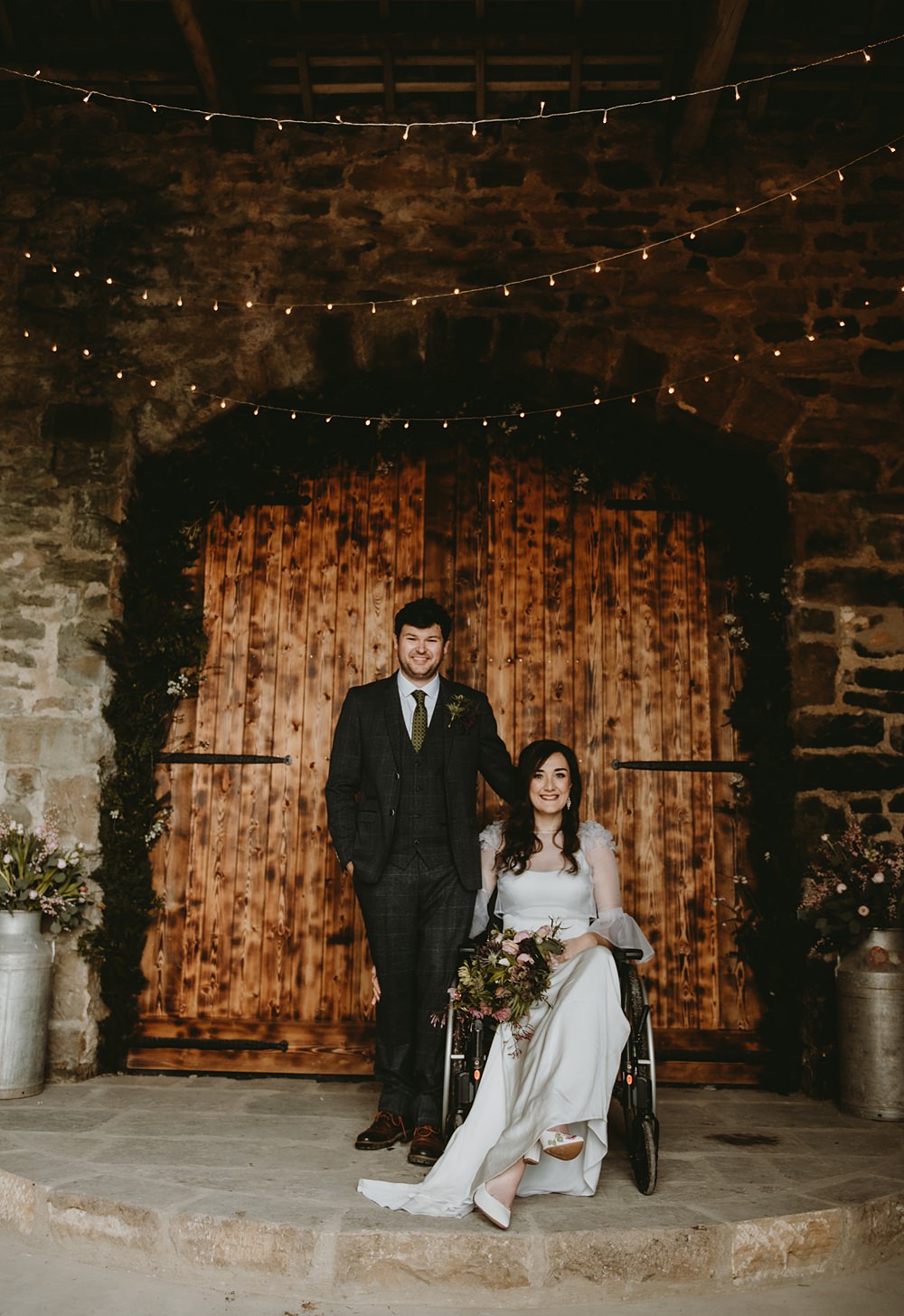 Bride Wheelchair Fairy Lights Barn Greenery Arch Little Seed Field Wedding Louise Pollitt Photography