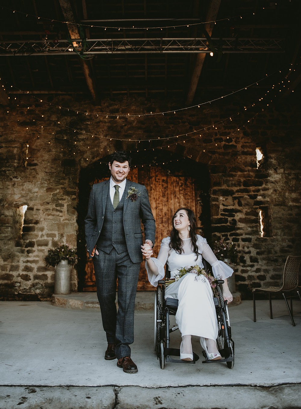 Bride Wheelchair Fairy Lights Barn Greenery Arch Little Seed Field Wedding Louise Pollitt Photography