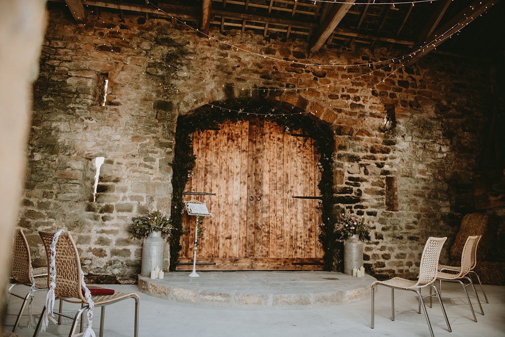 Ceremony Backdrop Greenery Arch Candles Little Seed Field Wedding Louise Pollitt Photography