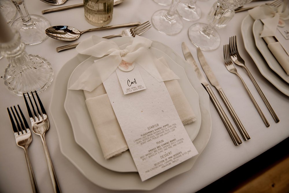 Place Setting Cream Napkin Ribbon Place Name Little Seed Field Wedding Louise Pollitt Photography