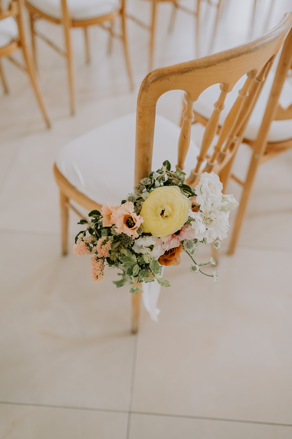 Northbrook Park Wedding Lucy Dracott Photography Aisle Chair Flowers Yellow Peach Spring