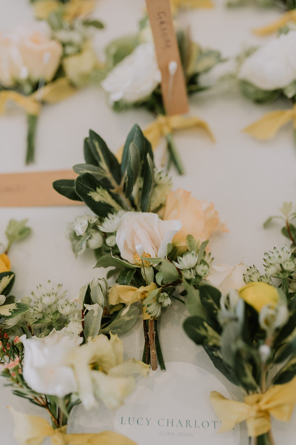 Flowers Yellow Peach Spring Buttonholes Northbrook Park Wedding Lucy Dracott Photography