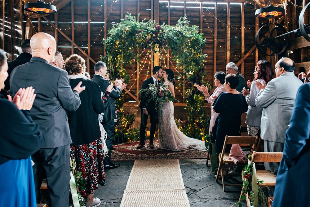 Chair Pew End Ceremony Flowers Aisle Greenery Arch Red Greenery Wedding Three Flowers Photography