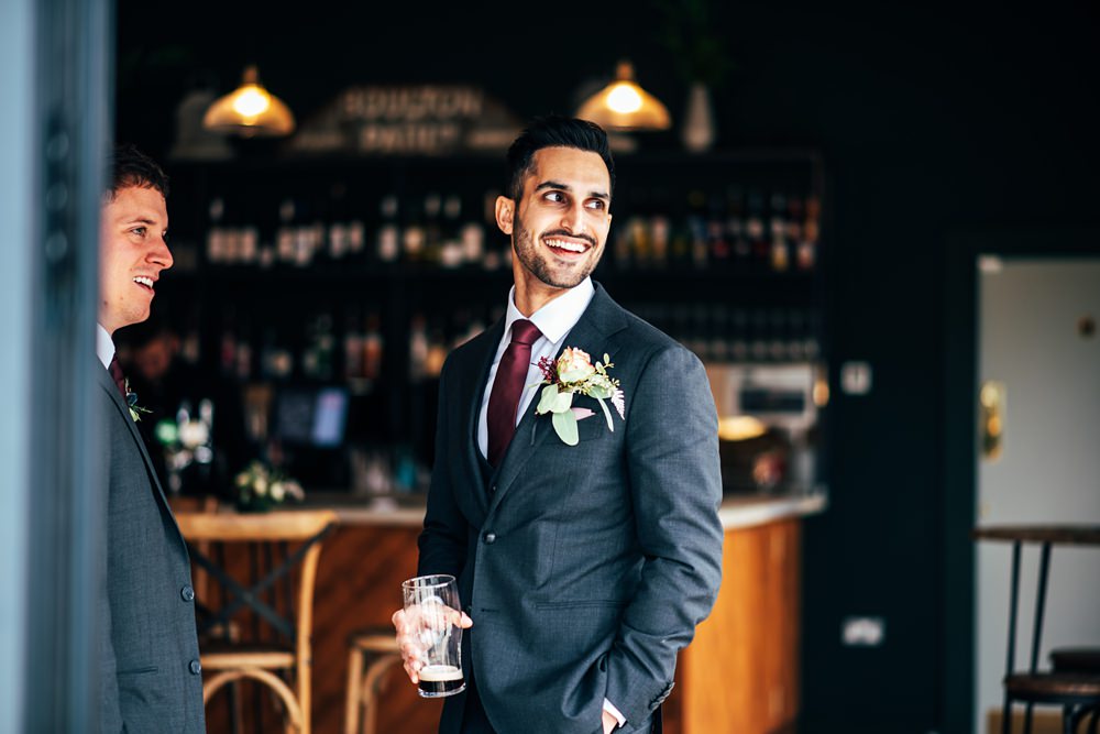 Groom Navy Suit Tie Red Greenery Wedding Three Flowers Photography
