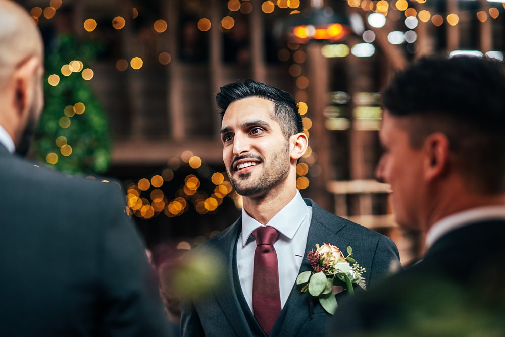 Groom Navy Suit Tie Red Greenery Wedding Three Flowers Photography