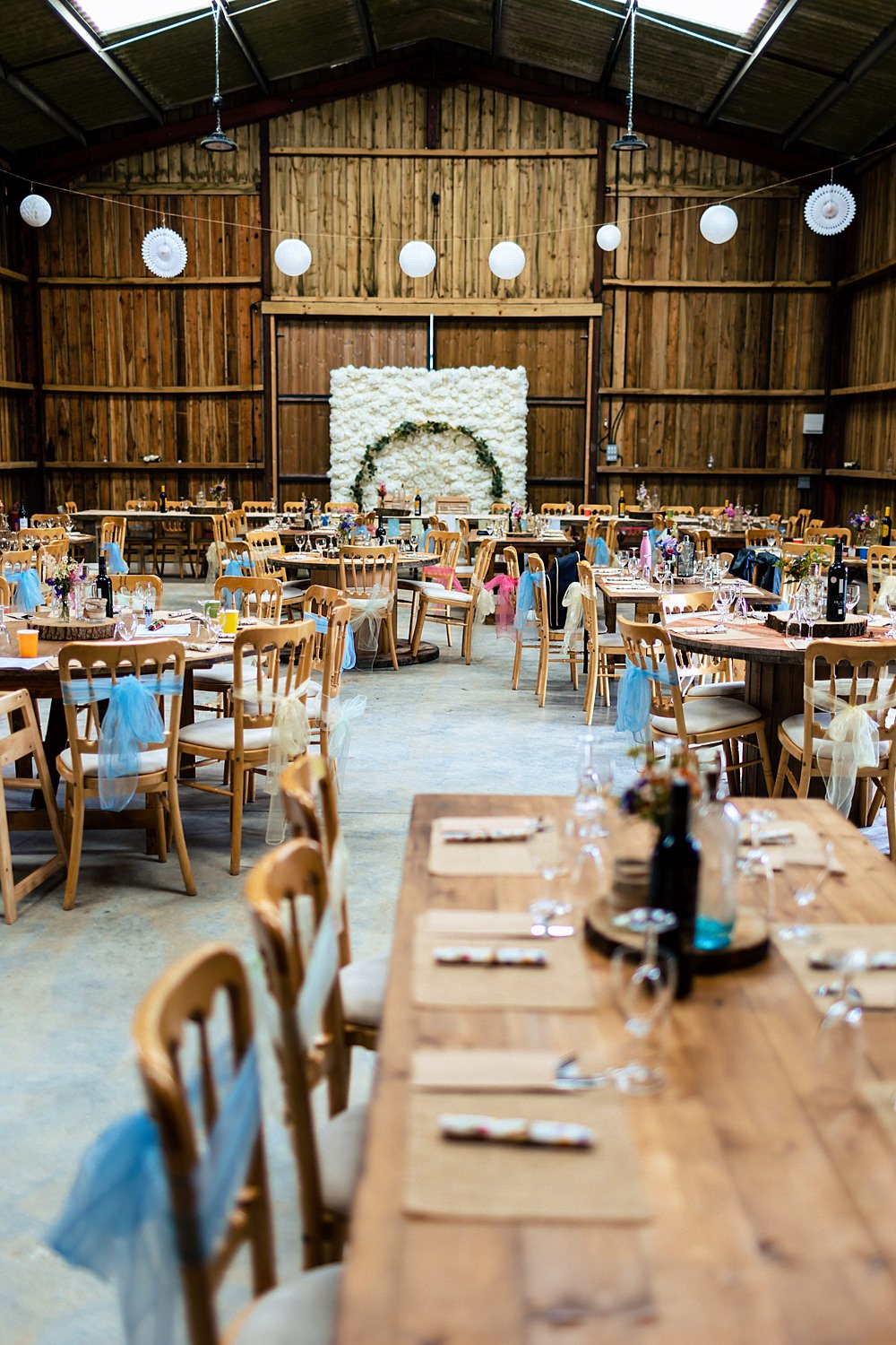 Barn Reception Flower Wall Rustic Tables Decor Rushmere Farm Workshops Wedding Jason Williams Photography