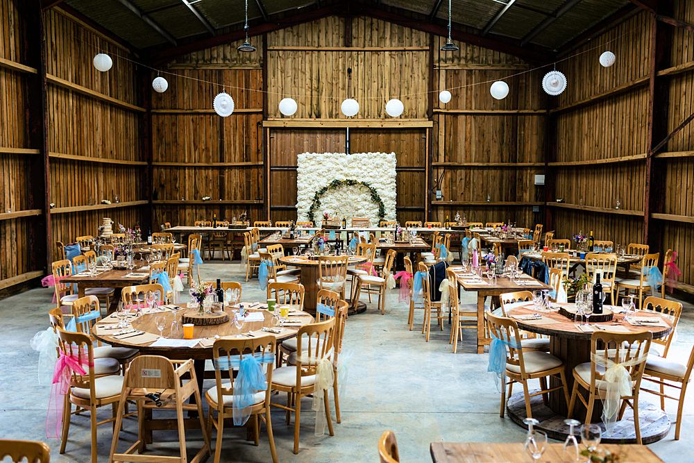 Barn Reception Flower Wall Rustic Tables Decor Rushmere Farm Workshops Wedding Jason Williams Photography