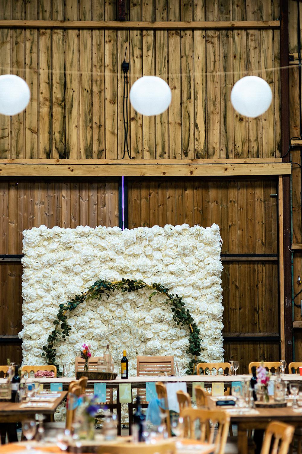 Barn Reception Flower Wall Rustic Tables Decor Rushmere Farm Workshops Wedding Jason Williams Photography