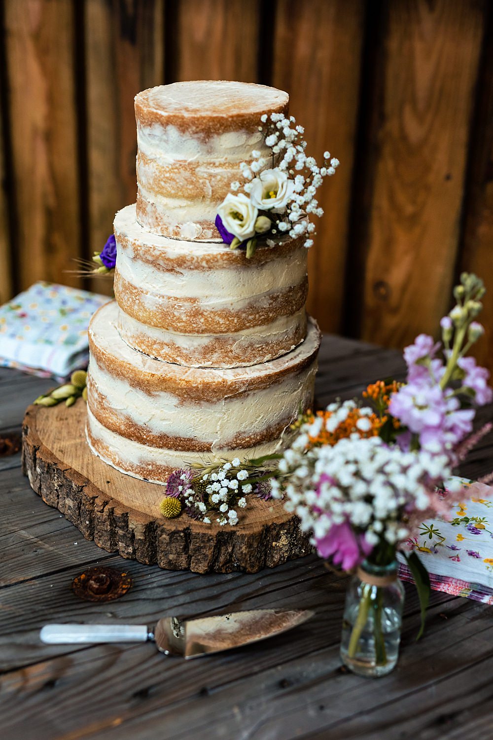 Semi Naked Cake Flowers Log Slice Stand Rushmere Farm Workshops Wedding Jason Williams Photography