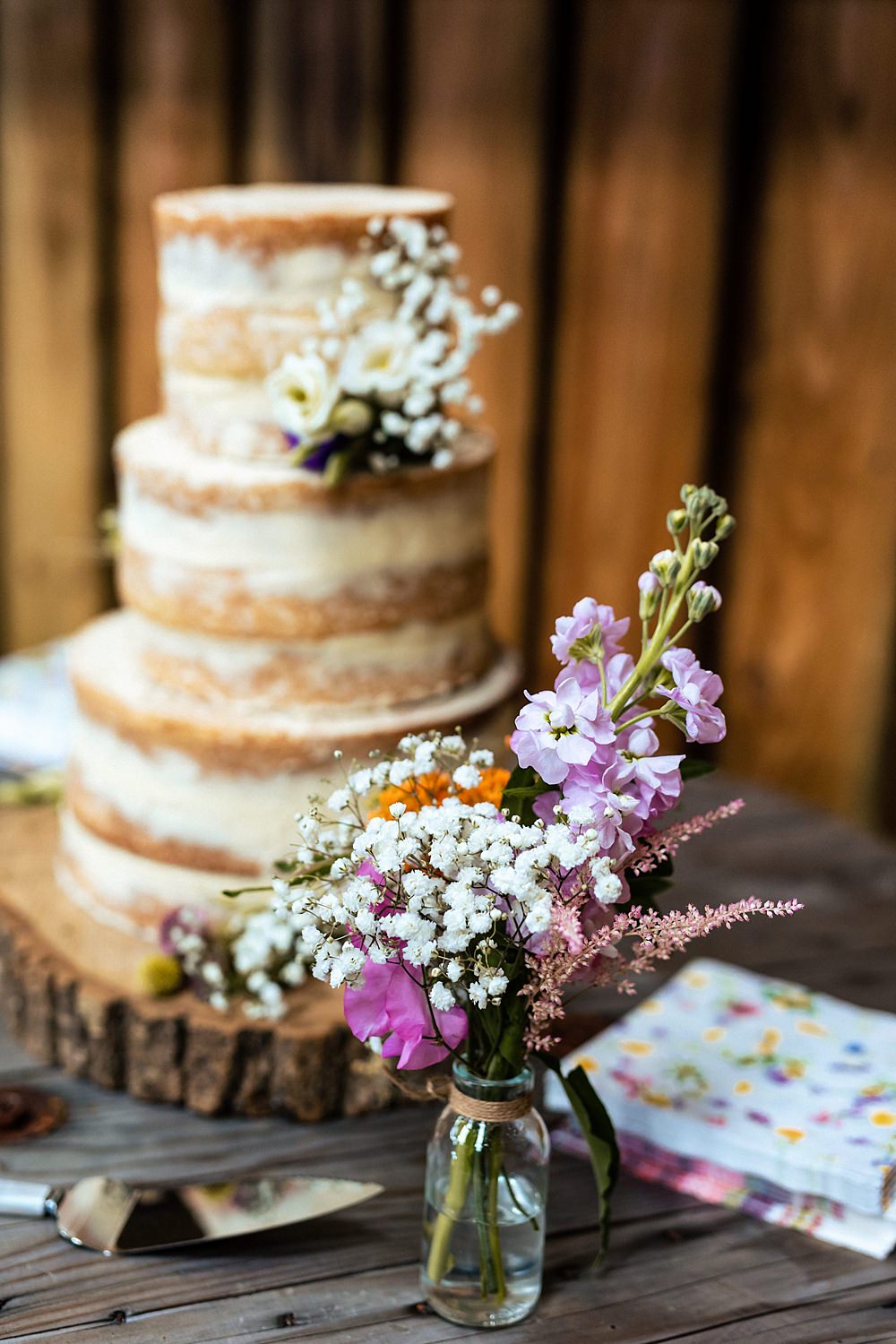 Semi Naked Cake Flowers Log Slice Stand Rushmere Farm Workshops Wedding Jason Williams Photography