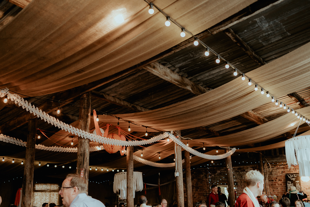 Barn Decor Drapes Garlands Pom Poms Festoon Lights Sri Lankan English Wedding Patrick Partridge Photography