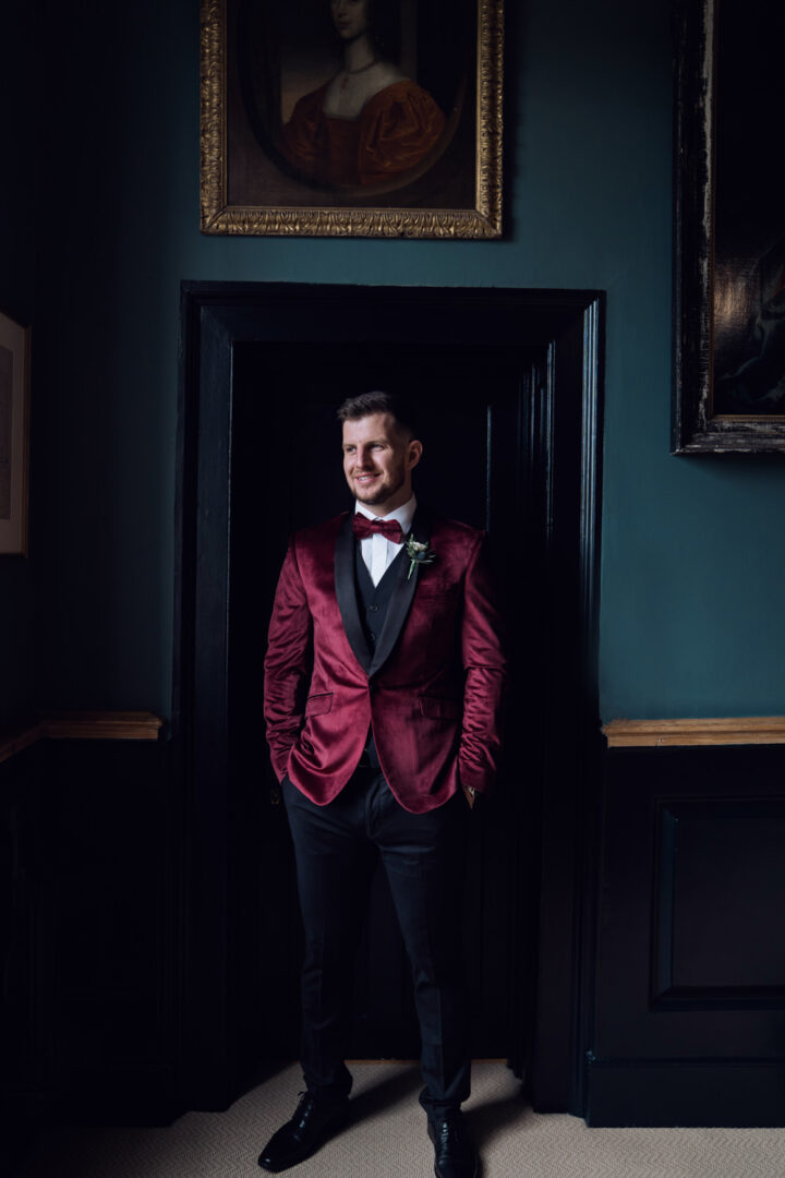 Christmas Wedding Velvet Red Groom Jacket Jessica Raphael Photography