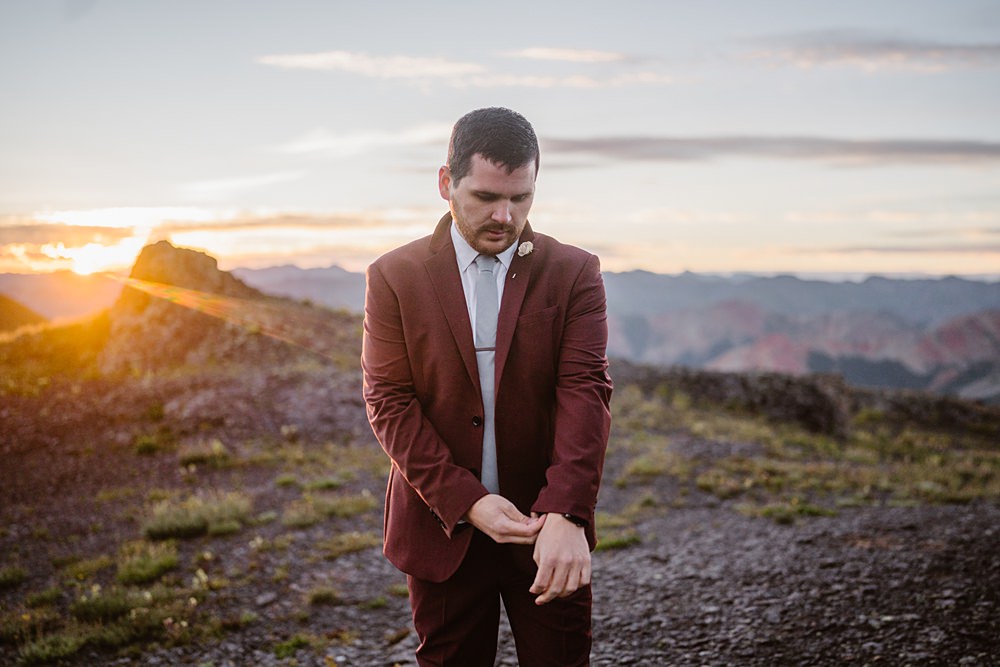 Burgundy Suit Groom Hiking Elopement Vows and Peaks