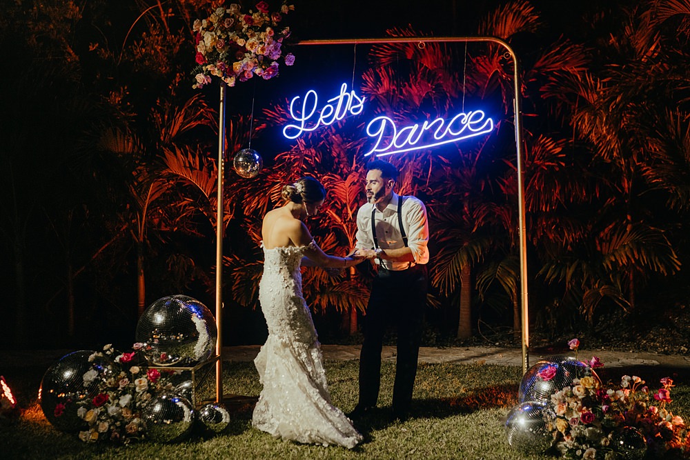 Neon Sign Backdrop Flowers Nizuc Resort Wedding Kape Photography