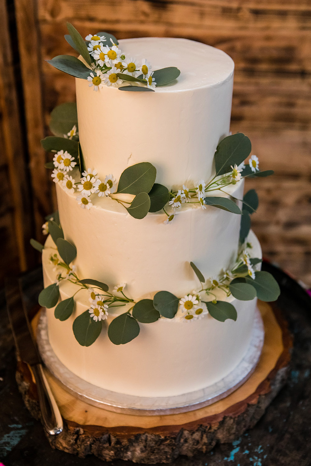 Iced Cake Greenery Rainbow Ribbon Barrell Stand Northumberland Barn Wedding Erika Tanith Photography