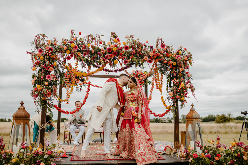 Hindu Mandap Flowers Red Yellow Indian Lithuanian Wedding Ellie Gillard Photography