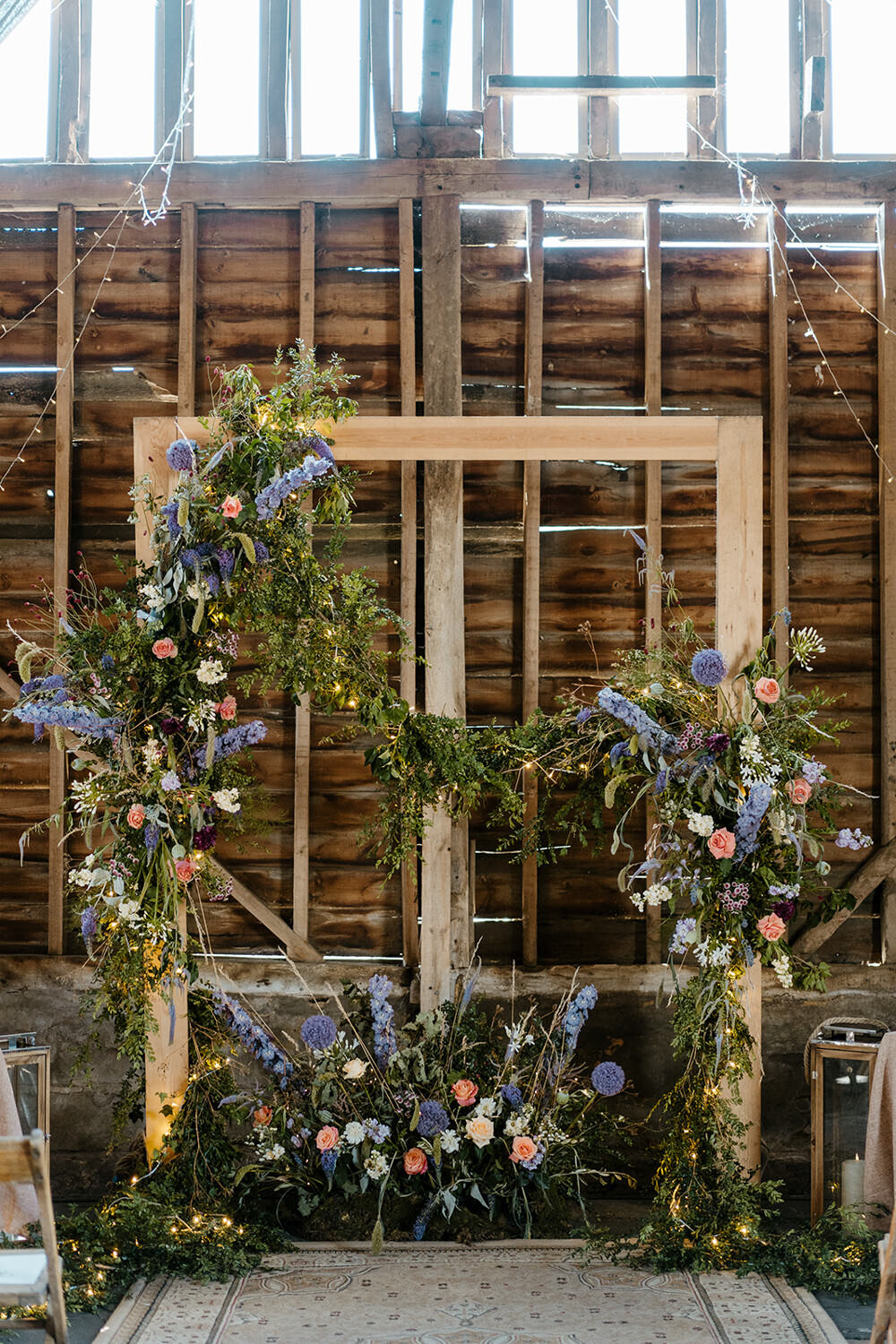 Wooden Arch Flowers Backdrop Ceremony Indian Lithuanian Wedding Ellie Gillard Photography