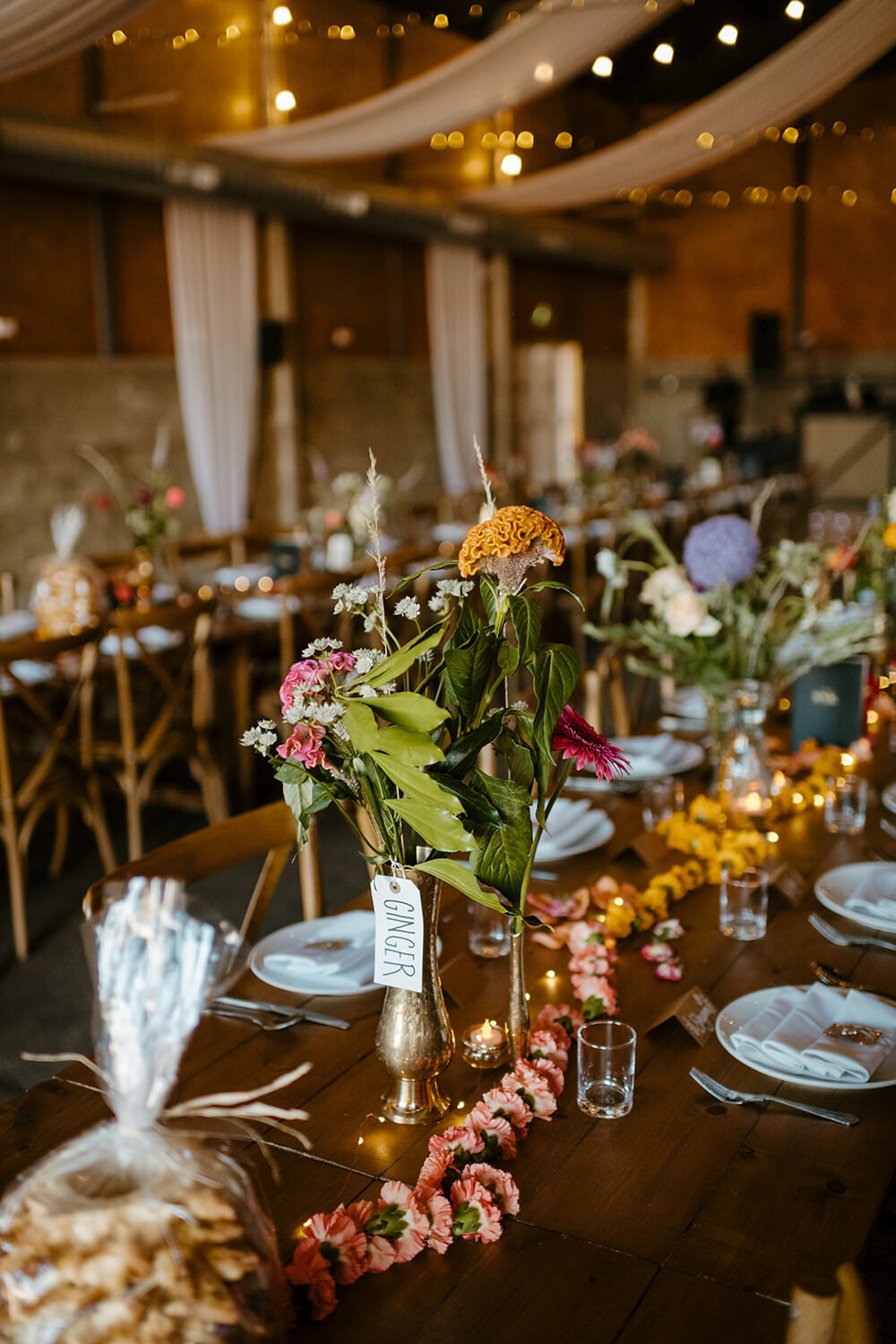Long Wooden Tables Barn Decor Flowers Indian Lithuanian Wedding Ellie Gillard Photography