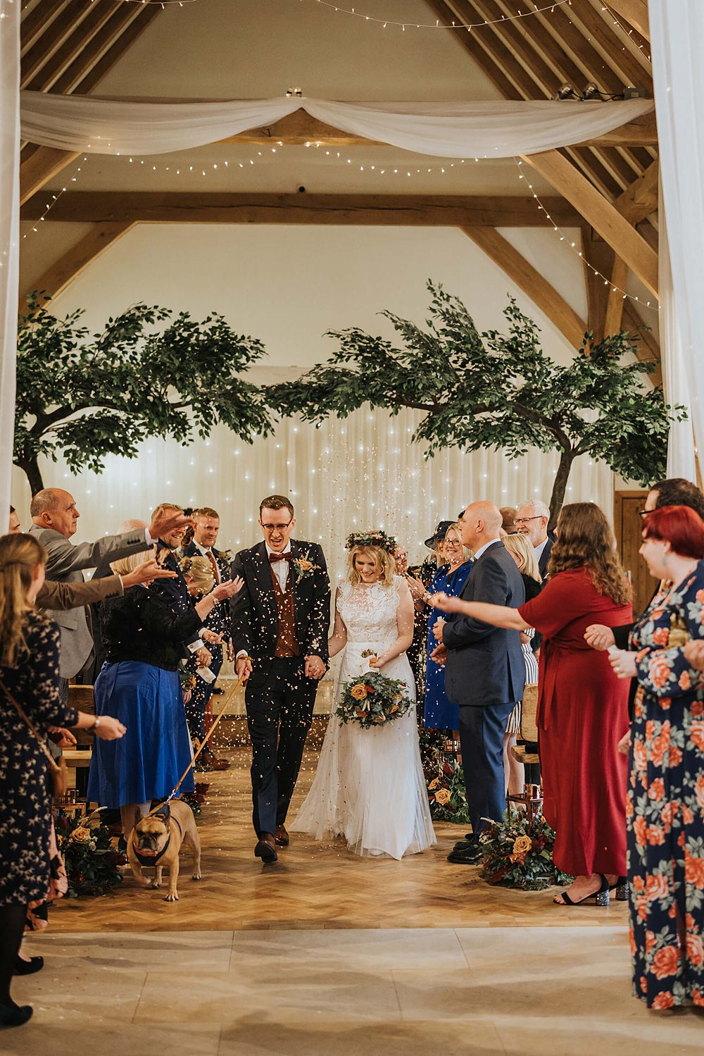Ceremony Aisle Flowers Trees Fairy Light Curtain Old Kent Barn Wedding Olegs & Rita Photography