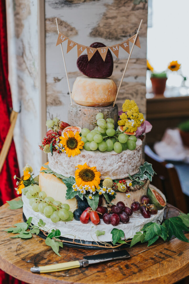 Cheese Wedding Cake Stack Sunflower Daisies Charlotte Razzell Photography
