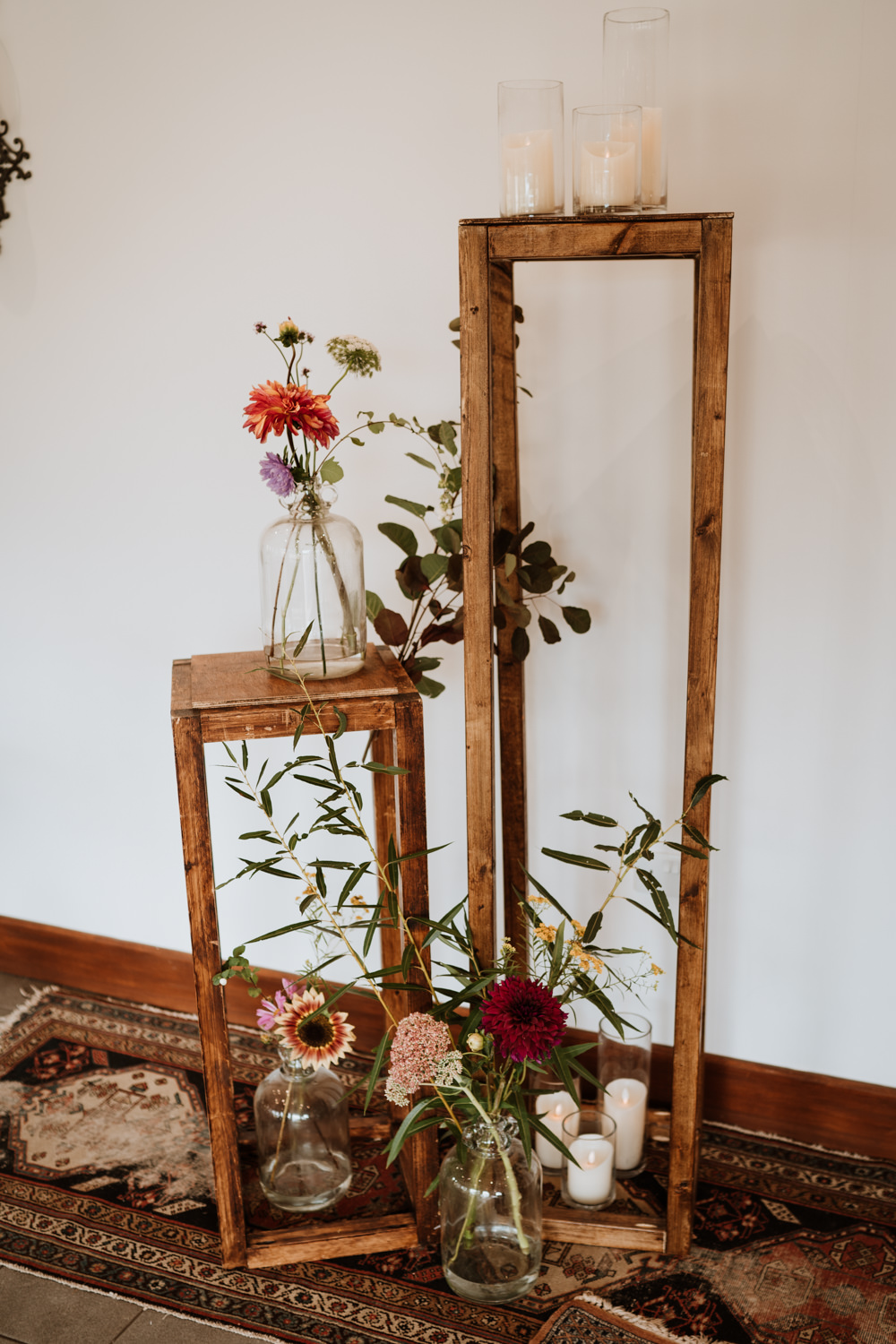 Aisle Backdrop Wooden Tower Flowers Rug Ceremony Kent Farm Barn Wedding Nicola Dawson Photography