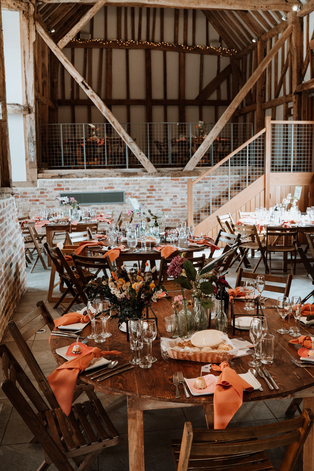 Round Wooden Tables Orange Napkins Decor Kent Farm Barn Wedding Nicola Dawson Photography