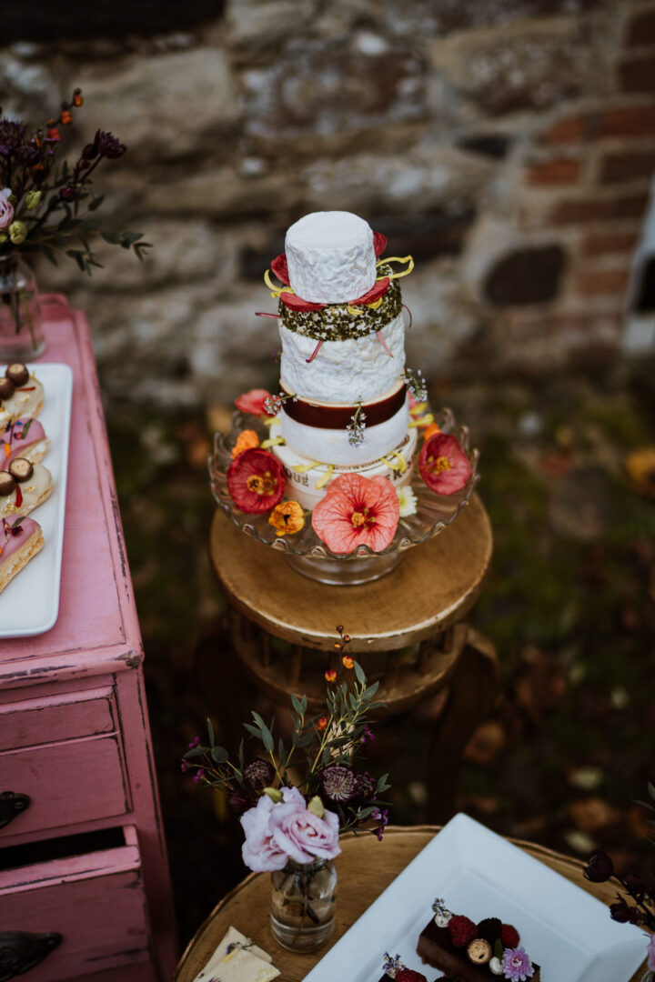 Small Cheese Wedding Cake Flowers Idea Nicola Dawson Photography