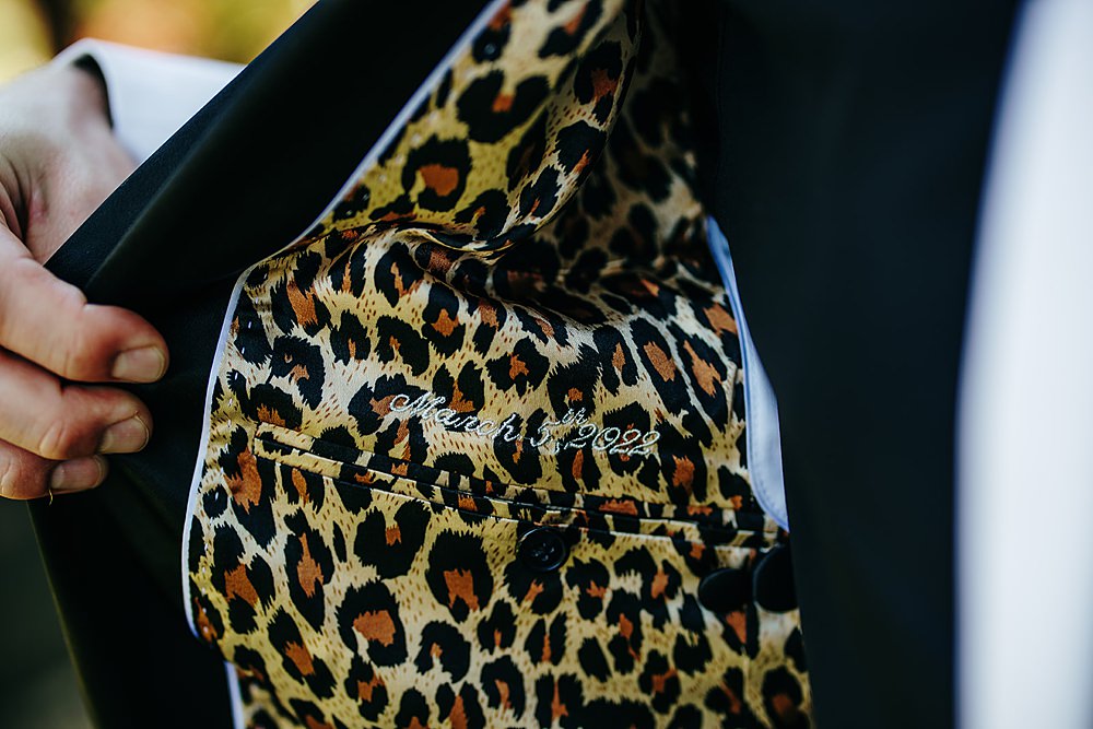 Groom Tuxedo White Jacket Leopard Lining Tropical Hawaii Wedding Couple Cups Photography