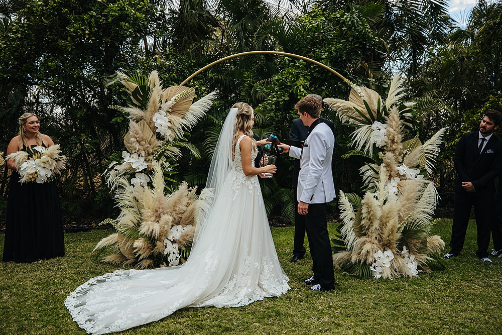 Pampas Grass Aisle Ceremony Flowers Hoop Tropical Hawaii Wedding Couple Cups Photography
