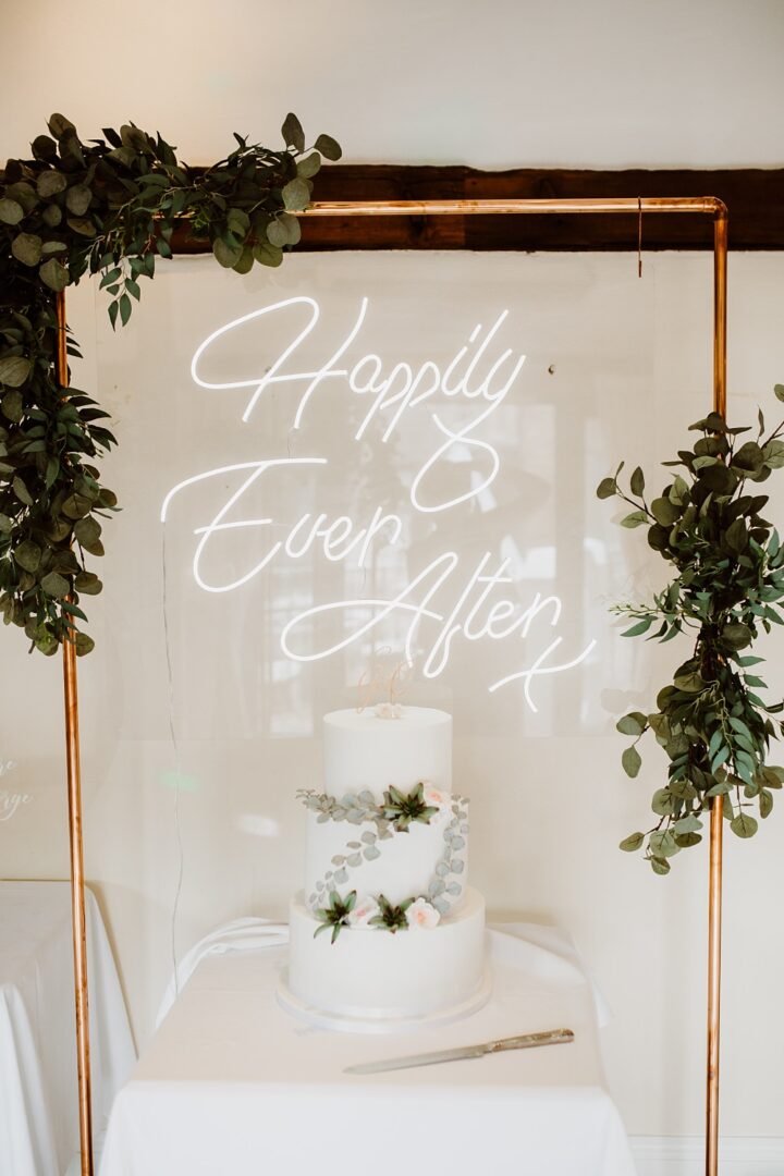 Wedding Lighting Idea Neon Sign Cake Table Holly Collings Photography