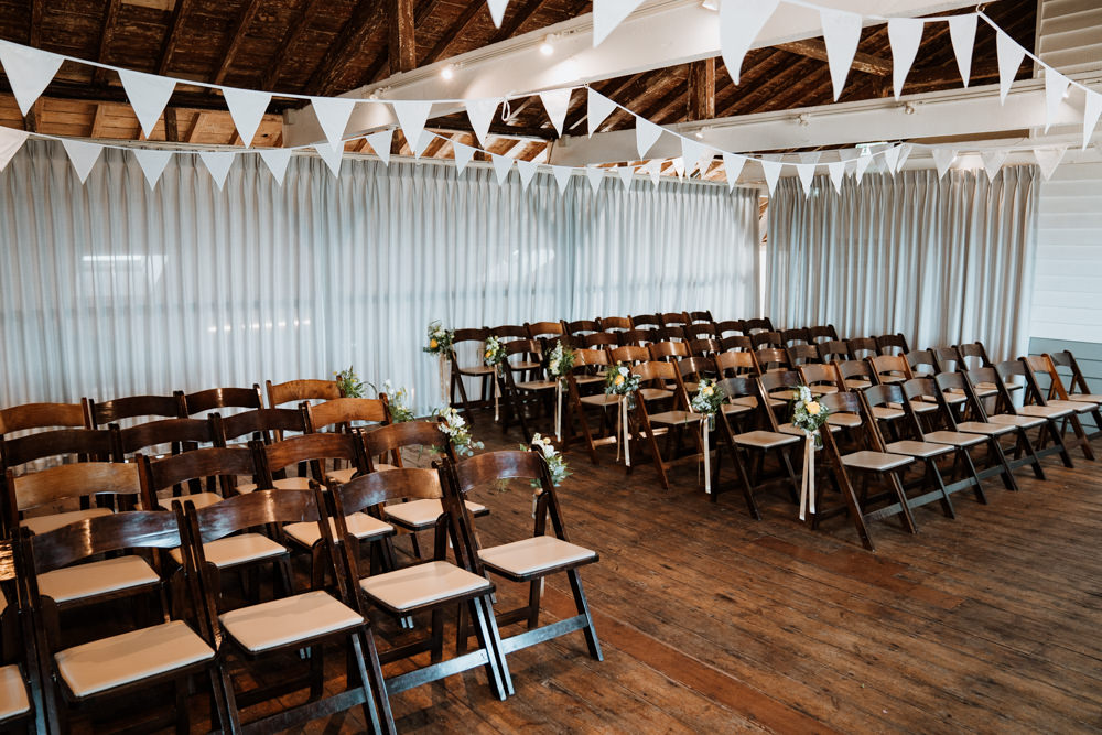 Flower Pew Ends Bunting Ceremony Room Whitstable Beach Wedding Nicola Dawson Photography