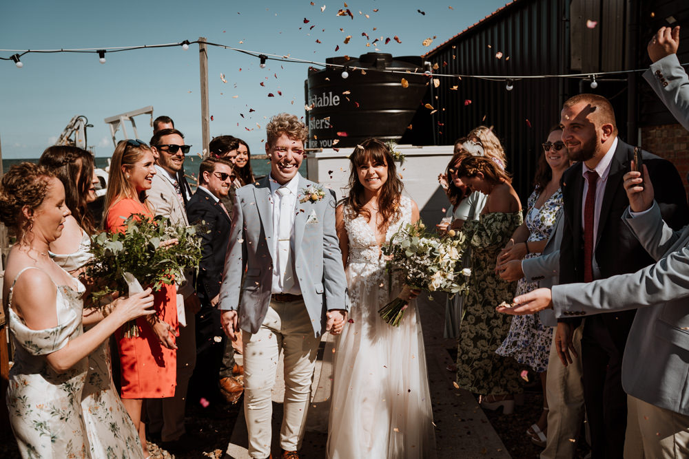 Confetti Throw Whitstable Beach Wedding Nicola Dawson Photography