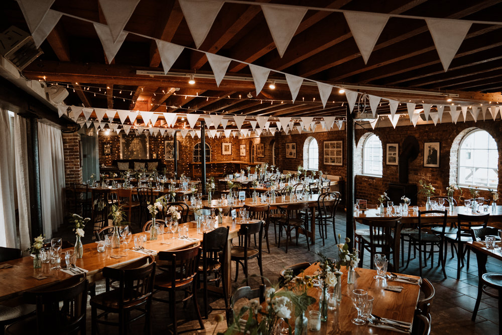 Barn Reception Decor Bunting Whitstable Beach Wedding Nicola Dawson Photography